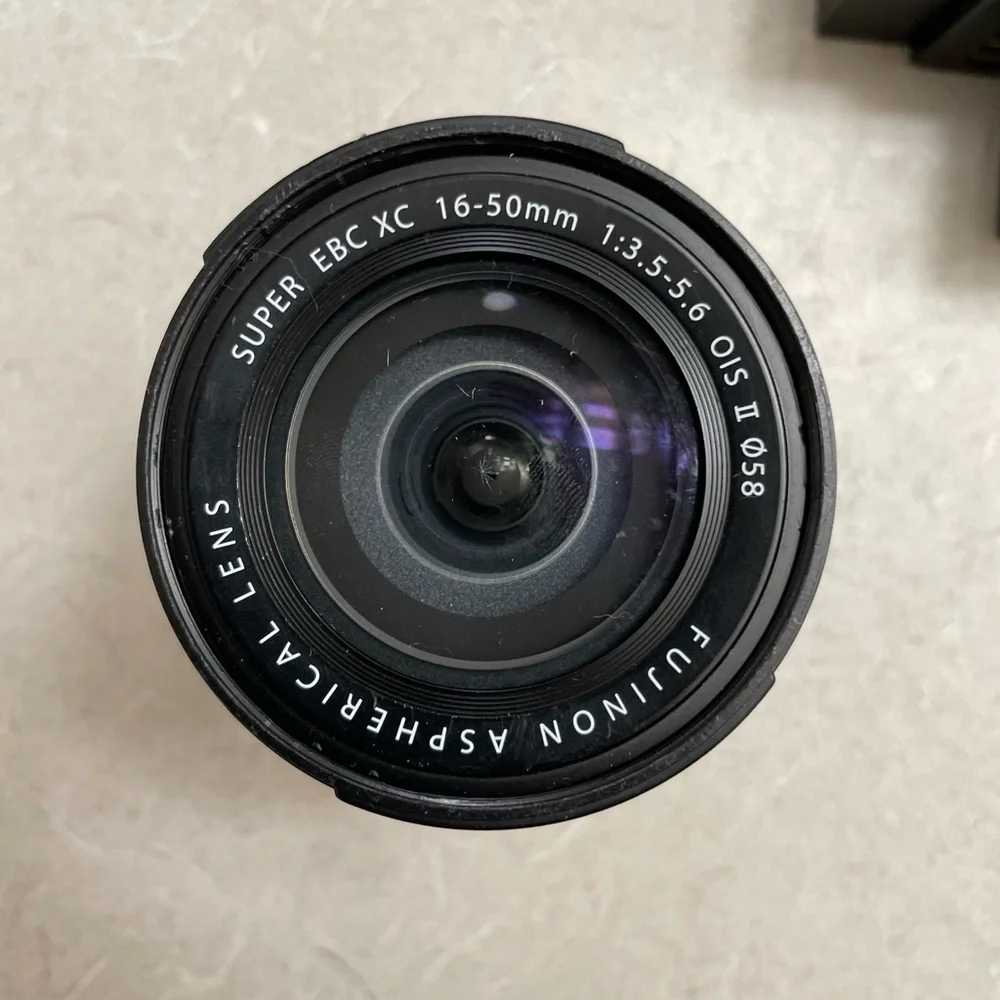 Fuji XT10 with 2 Straps, charger, 5x Batteries, 2 lenses!